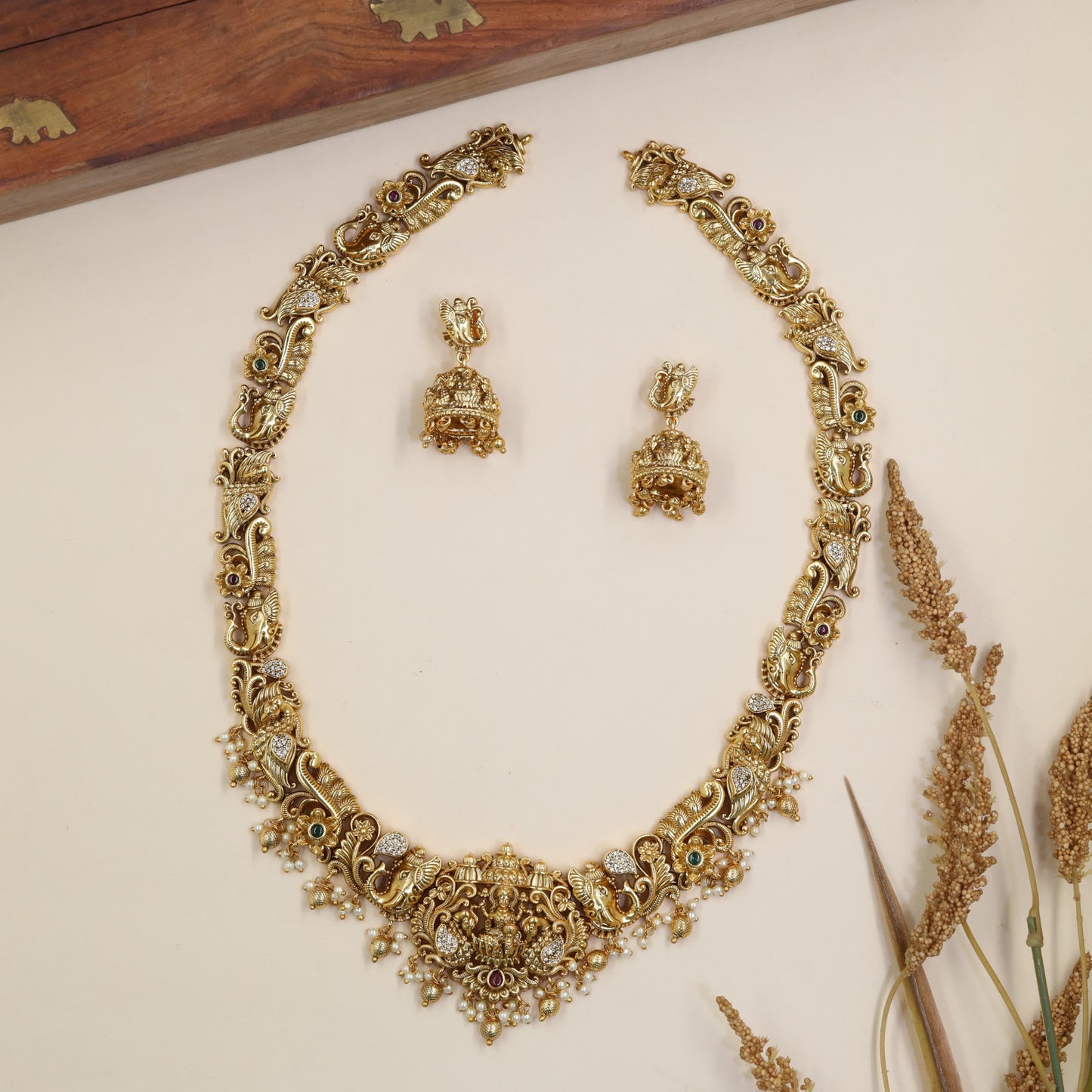Lakshmi Long Haara With Intricate Curved Sections And Hanging Drops