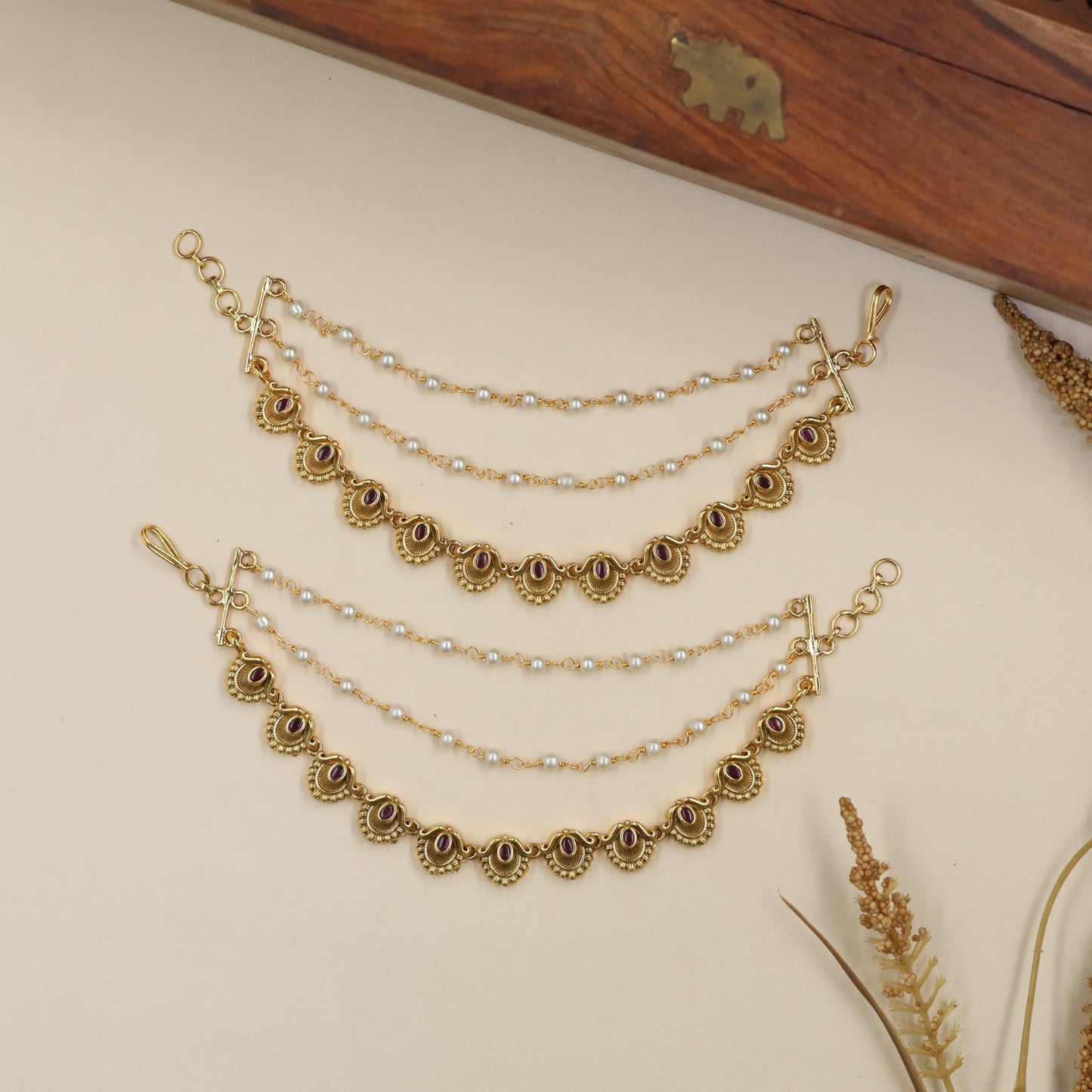 Classical Mati With Repeating Floral Links And Delicate Beaded Curves