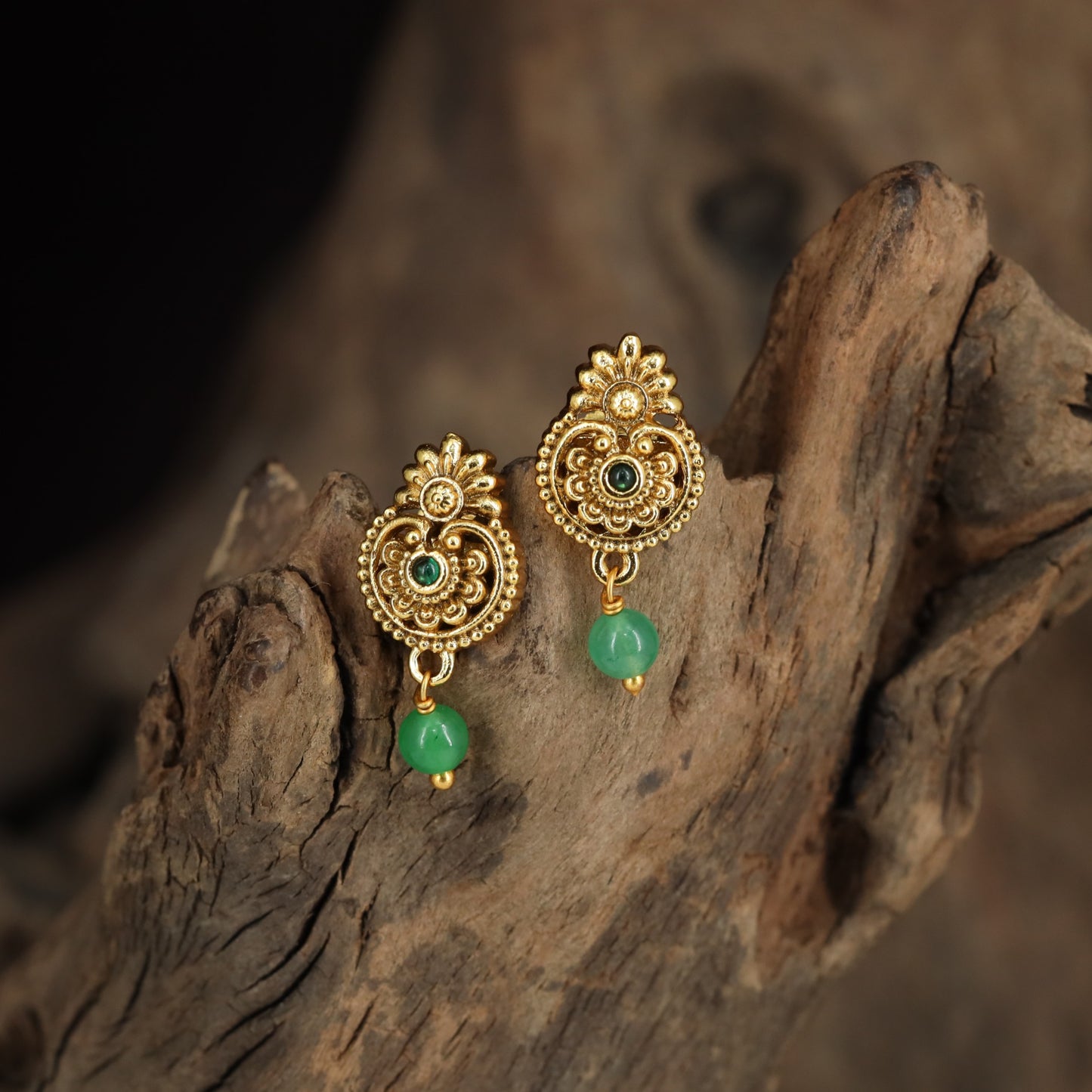 Floral Stud Earrings With Intricate Scrollwork And Textured Drops