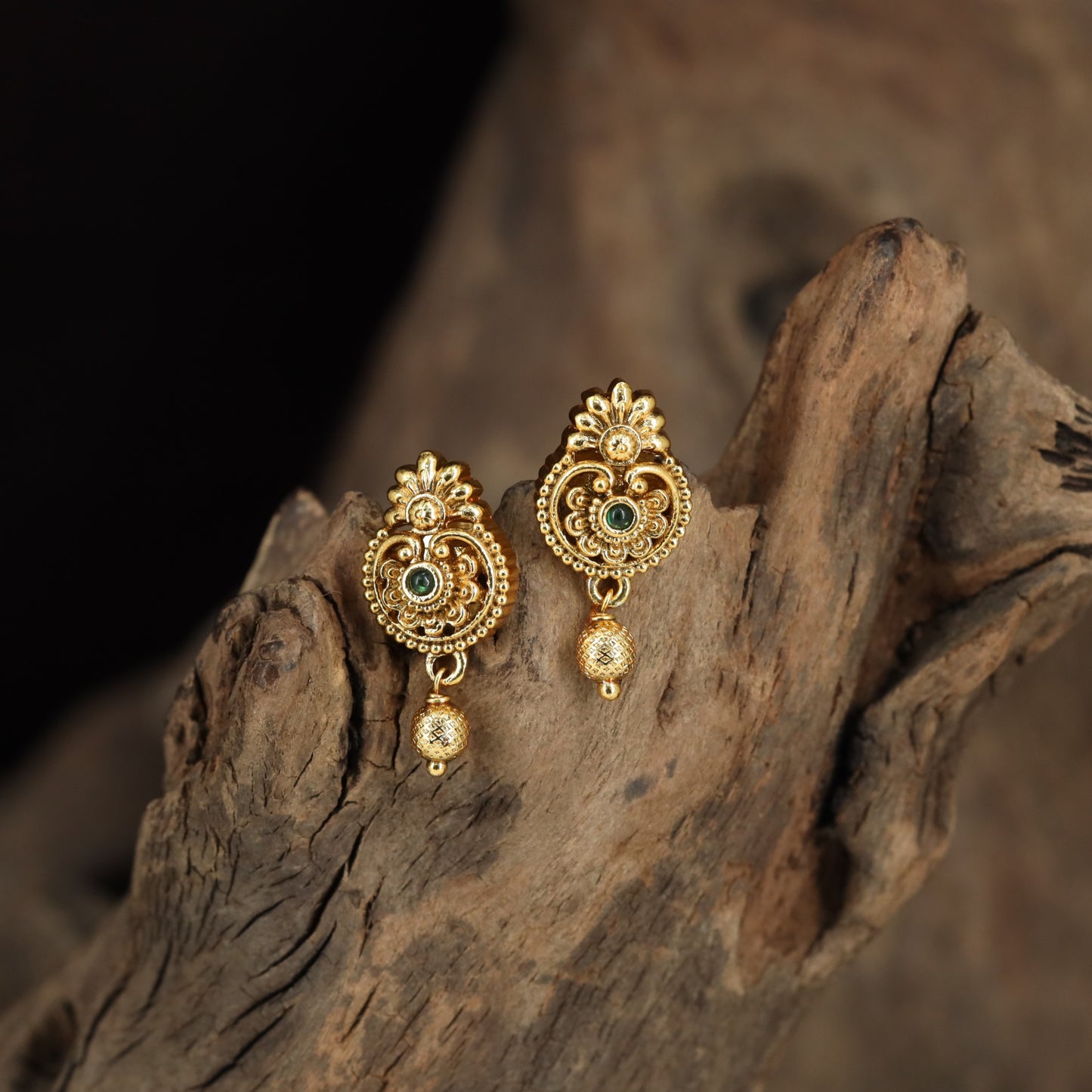 Floral Stud Earrings With Intricate Scrollwork And Textured Drops