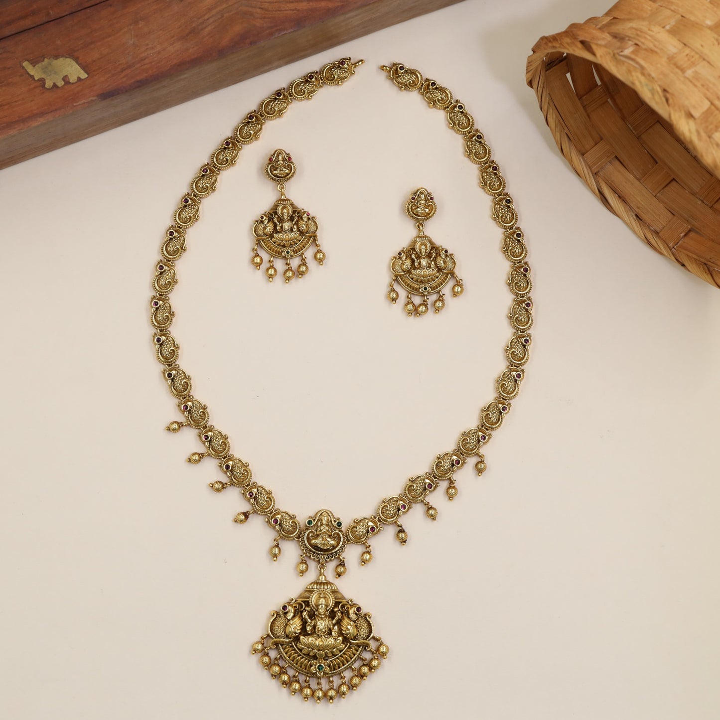 Temple Style Long Haara With Lakshmi Pendant And Spherical Drops