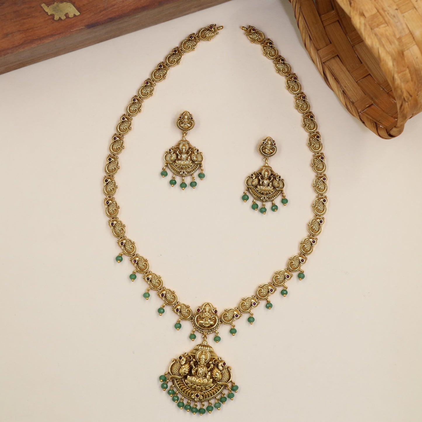 Temple Style Long Haara With Lakshmi Pendant And Spherical Drops