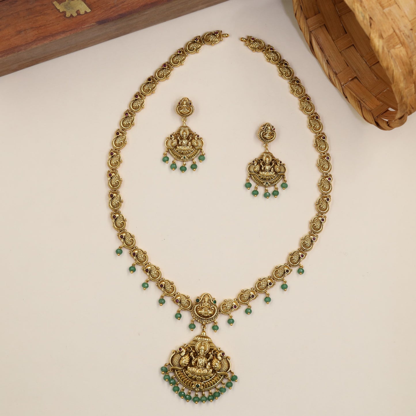 Temple Style Long Haara With Lakshmi Pendant And Spherical Drops