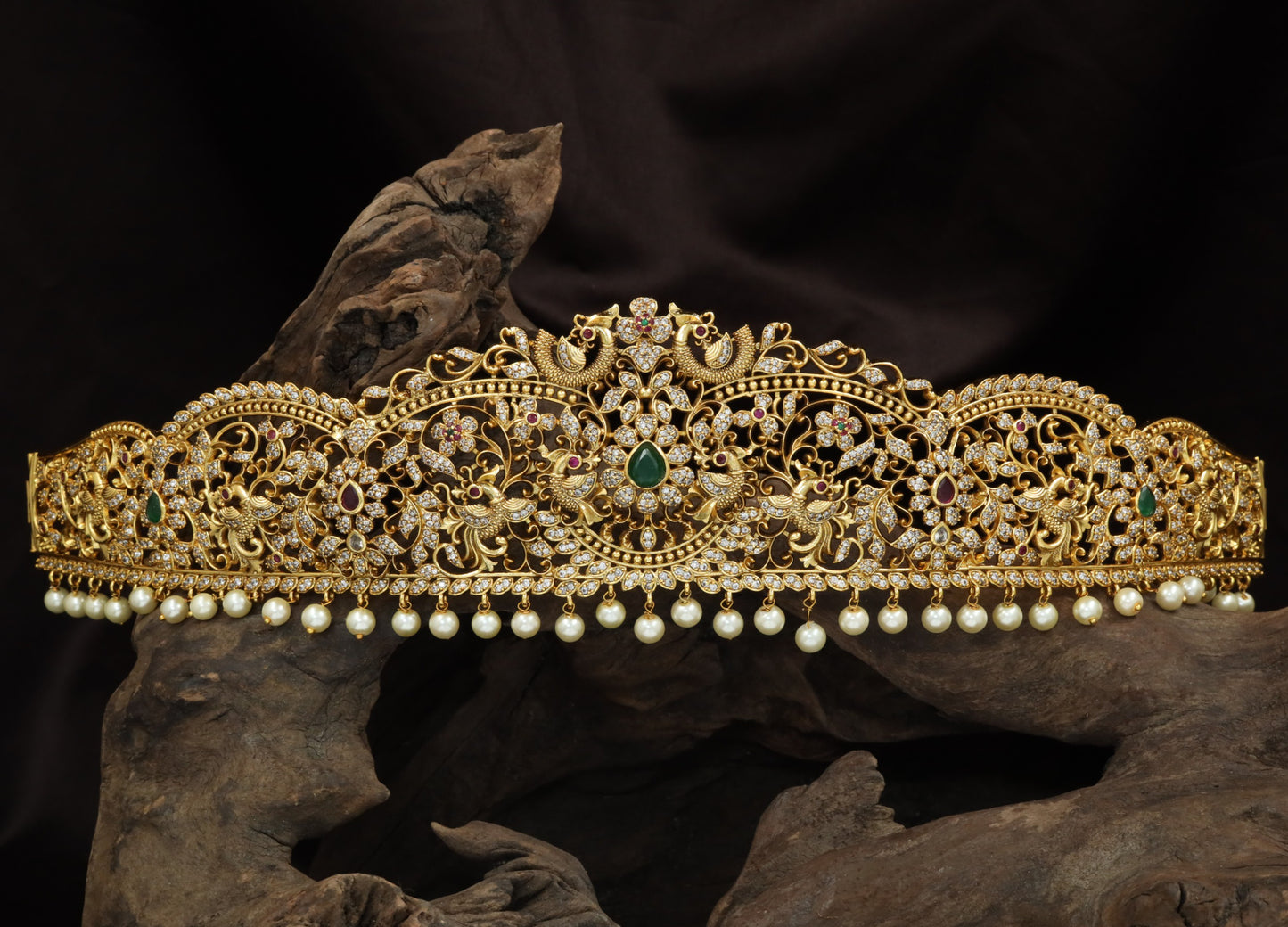 Sculpted Peacock Dabu With Intricate Filigree Work And Pearl Drop Fringe