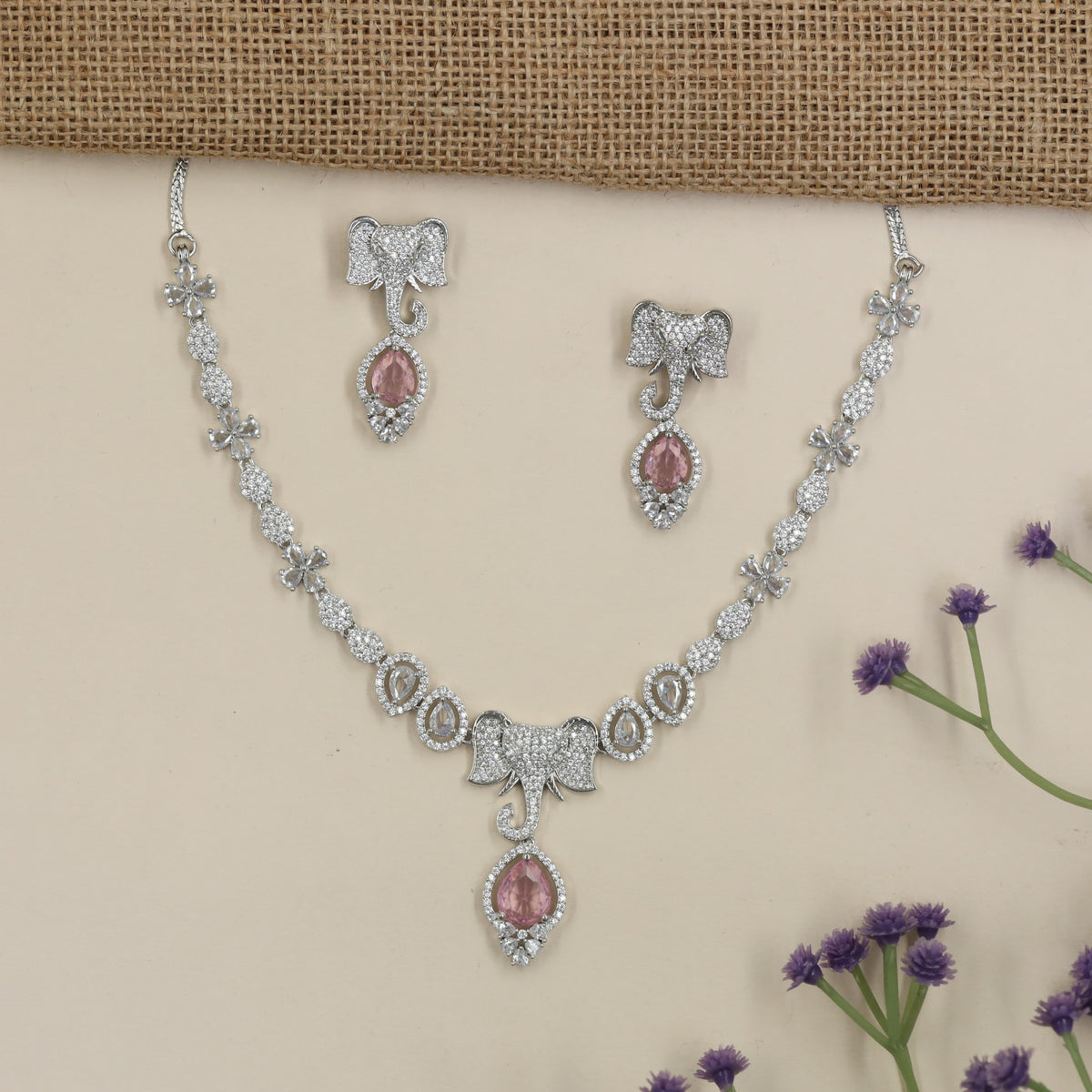 Rhodium Elephant Necklace with Bow Centre & Pear Drop