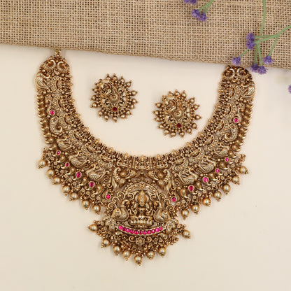 Premium Antique Necklace Featuring Lakshmi Pendant, Scrollwork And Decorative Bead Drops