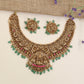 Premium Antique Necklace Featuring Lakshmi Pendant, Scrollwork And Decorative Bead Drops