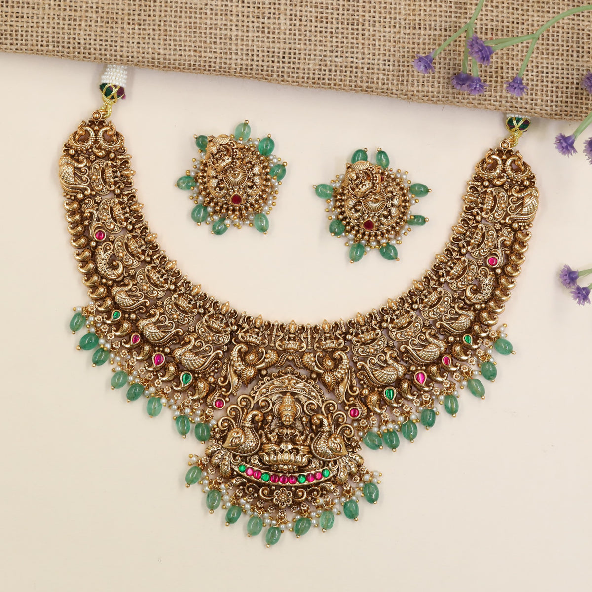 Premium Antique Necklace Featuring Lakshmi Pendant, Scrollwork And Decorative Bead Drops
