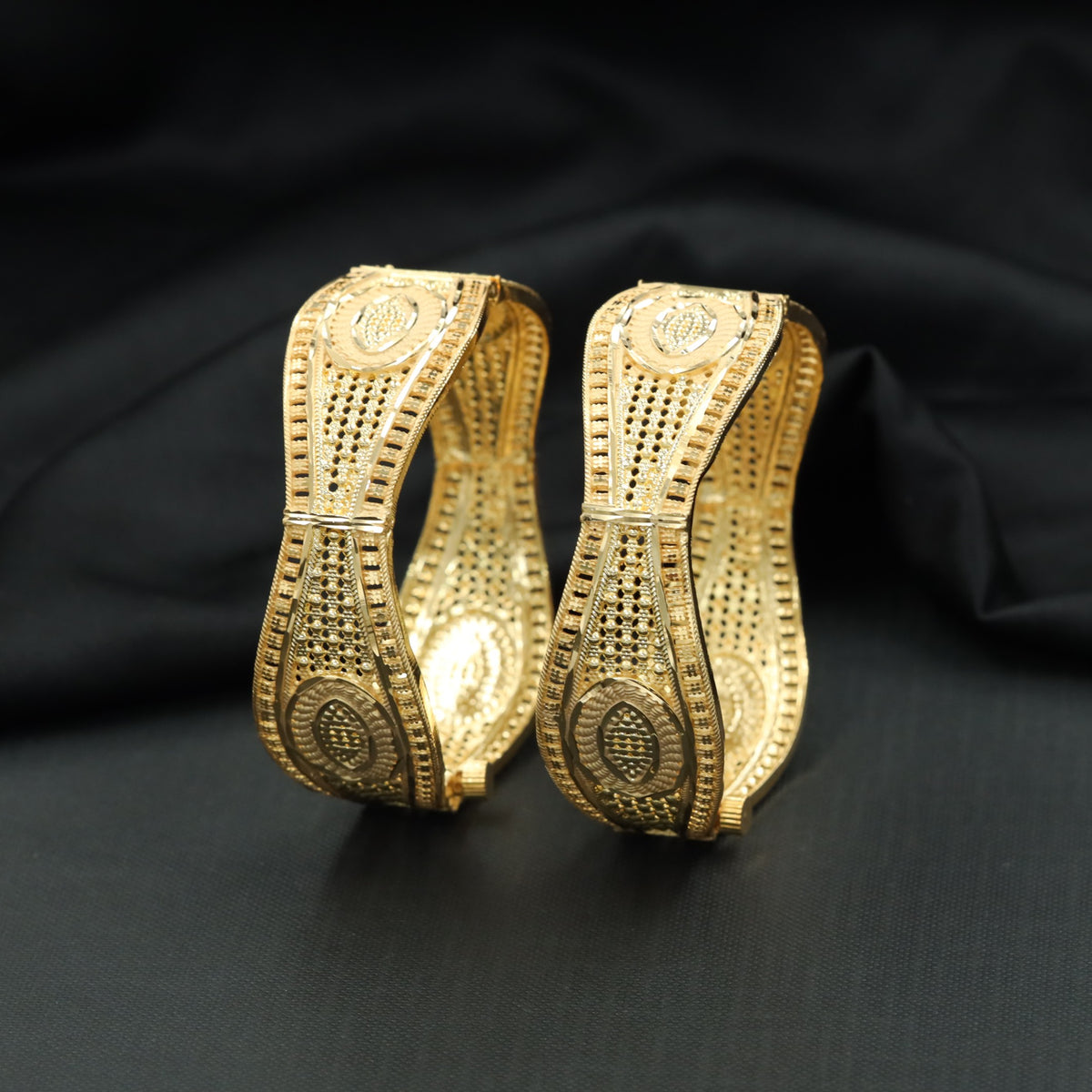 Gold Plated Bangle with Curved Openwork Panels