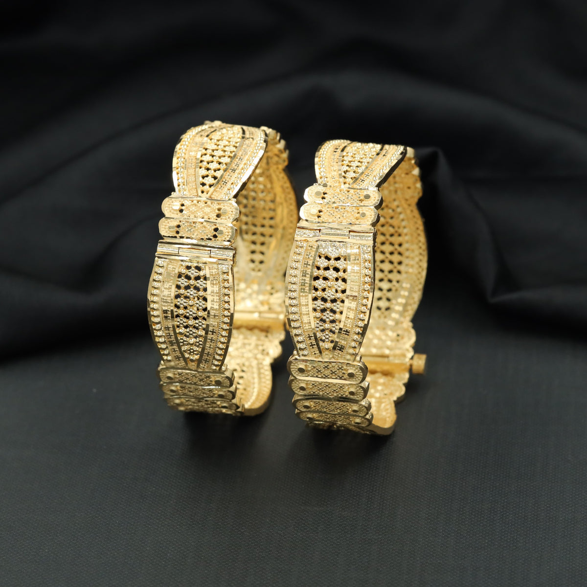 Gold Plated Bangle with Elongated Openwork Panels