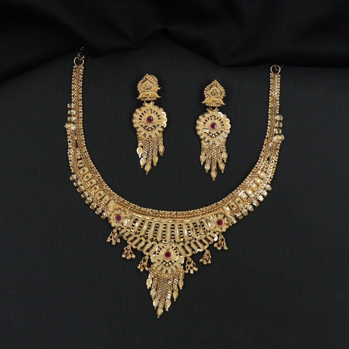Royal Gold Plated Necklace With Detailed Circular Pendant And Traditional Drop Accents