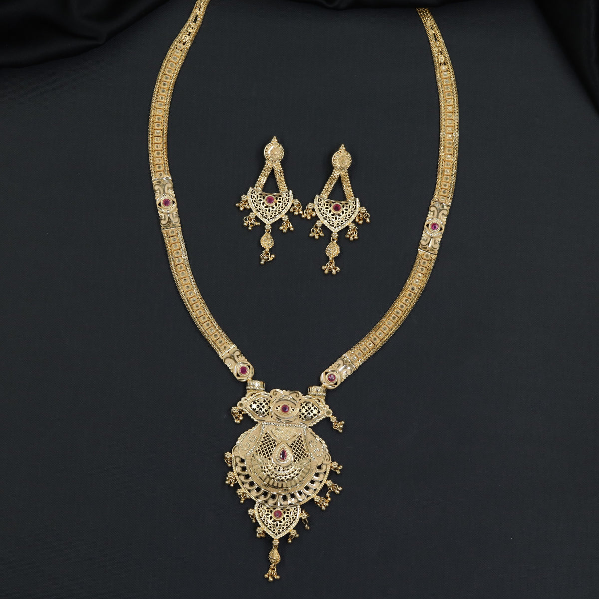 Gold Plated Long Haara With Ornamental Pendant Frame And Traditional Drop Detailing