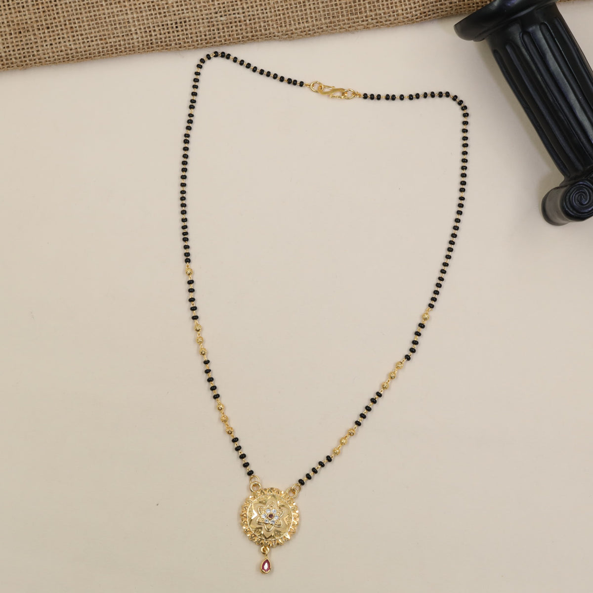 Gold Plated Mangalsutra with Floral Circular Pendant & Gold Accents
