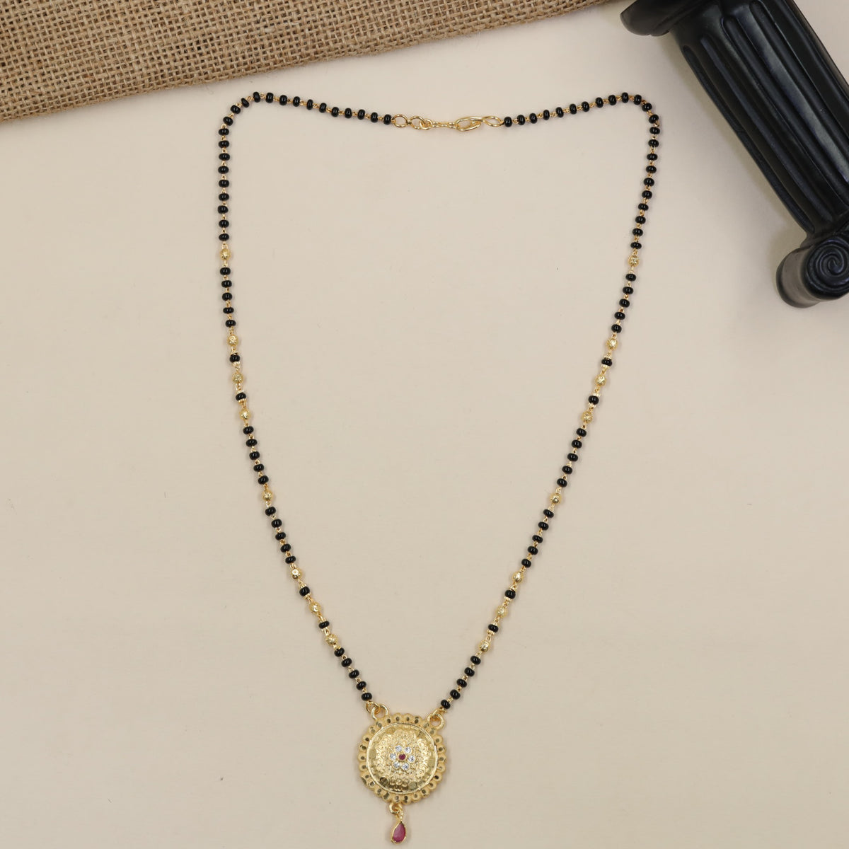 Gold Plated Mangalsutra with Framed Circular Pendant & Black Beads