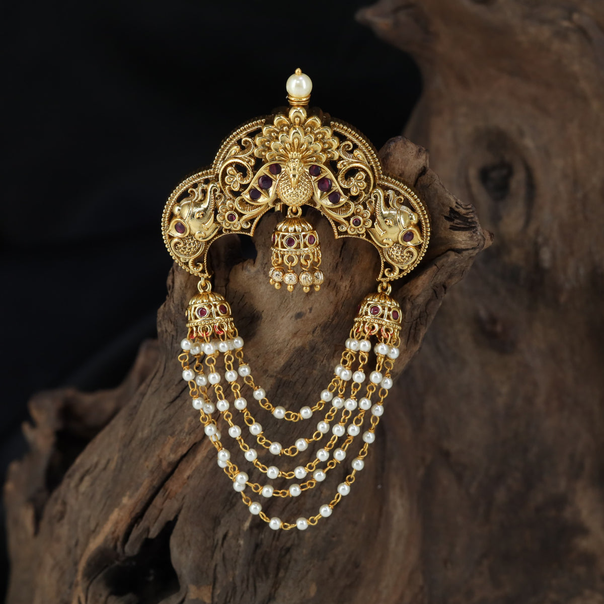 Antique Jade Bille with a sculpted peacock crest and cascading pearl-style strands