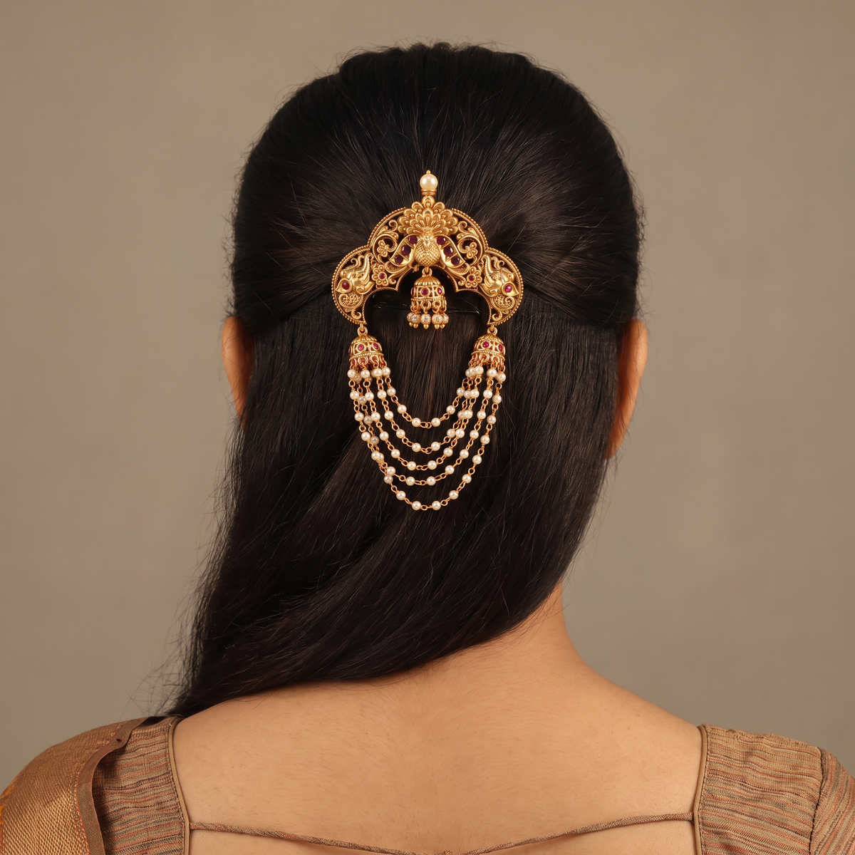 Antique Jade Bille with a sculpted peacock crest and cascading pearl-style strands