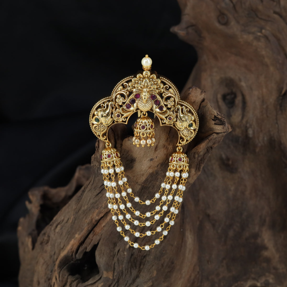 Antique Jade Bille with a sculpted peacock crest and cascading pearl-style strands