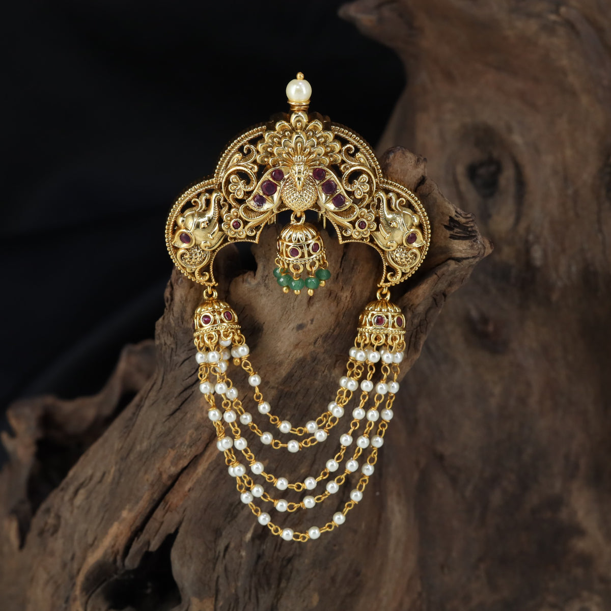 Antique Jade Bille with a sculpted peacock crest and cascading pearl-style strands