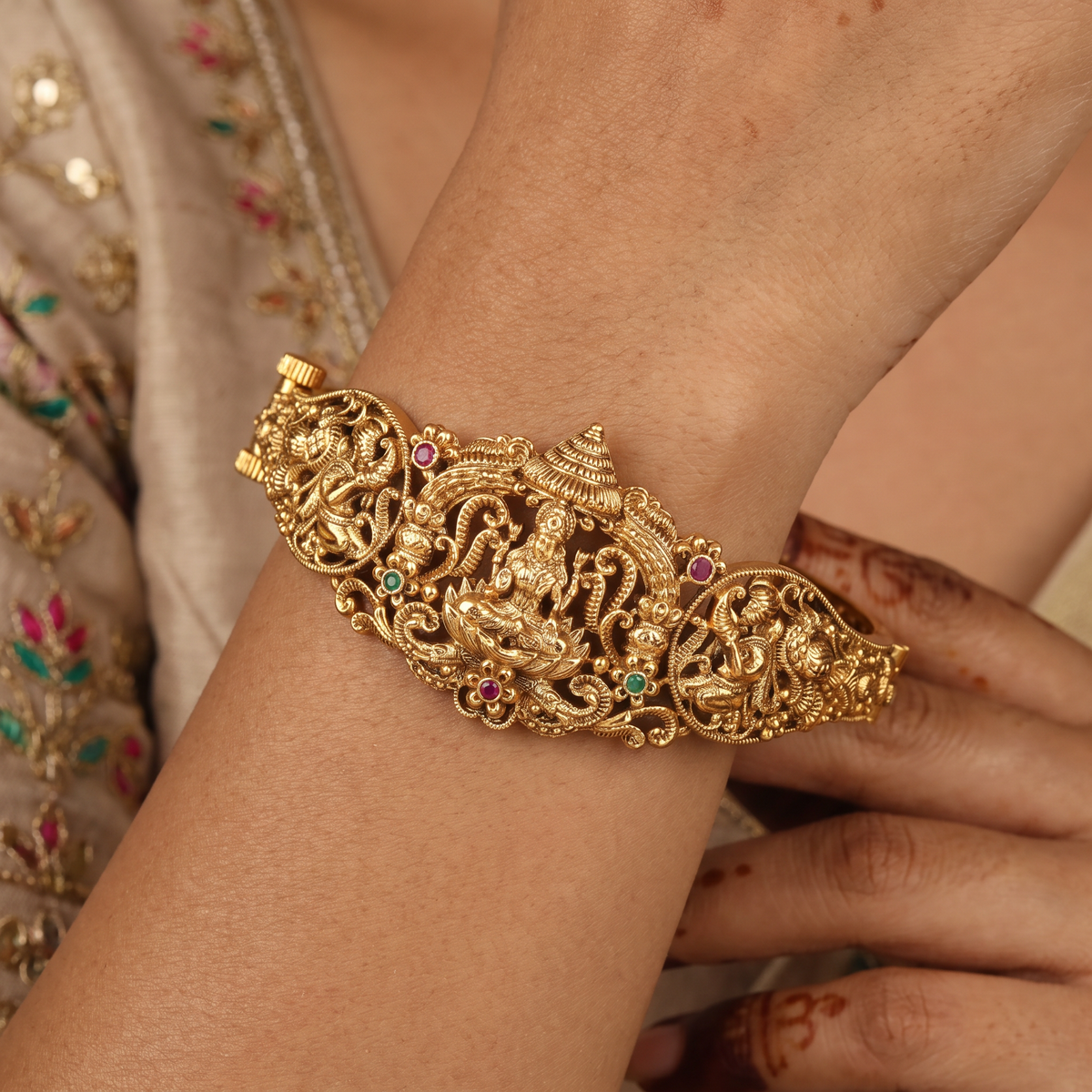 South Indian temple-style Kada showcasing sculpted Lakshmi artistry and elaborate sidework