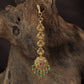 Occasion Wear Tikka with intricate floral detailing and an elaborate pendant arrangement
