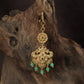 Regal peacock Tikka with ornate floral detailing and graceful hanging drops
