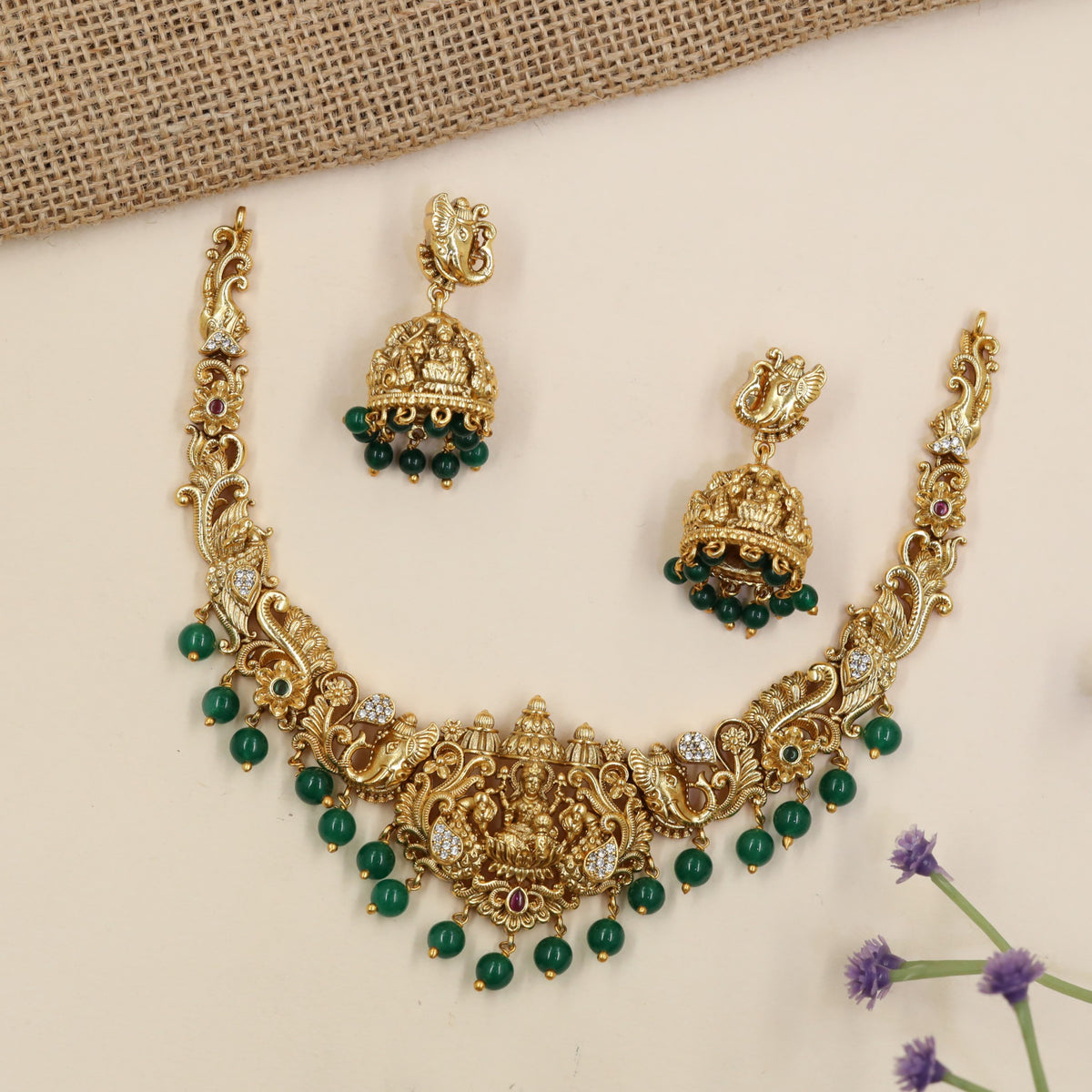 Royal Lakshmi necklace featuring elaborate curves, floral detailing and hanging accents