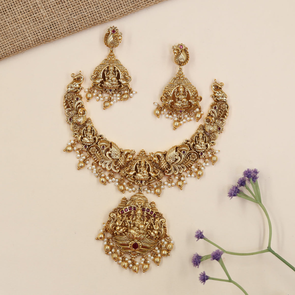 Grand temple-inspired necklace with Lakshmi pendant and dangling accents