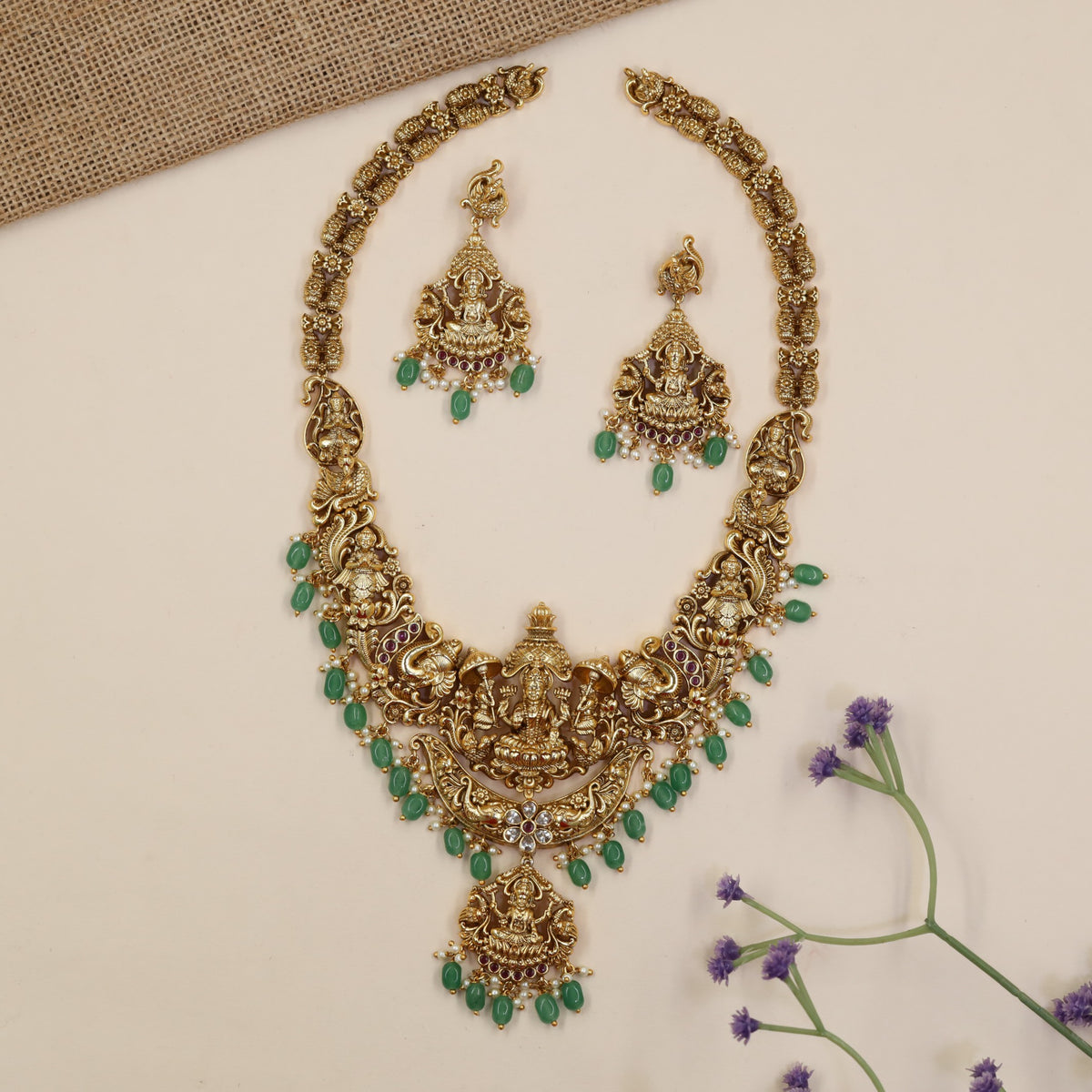 Temple-Inspired Long Haara Showcasing Lakshmi Centrepiece And Intricate Peacock Work