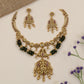 Vintage-inspired jewellery set showcasing Ganesha and symmetrical peacock artistry