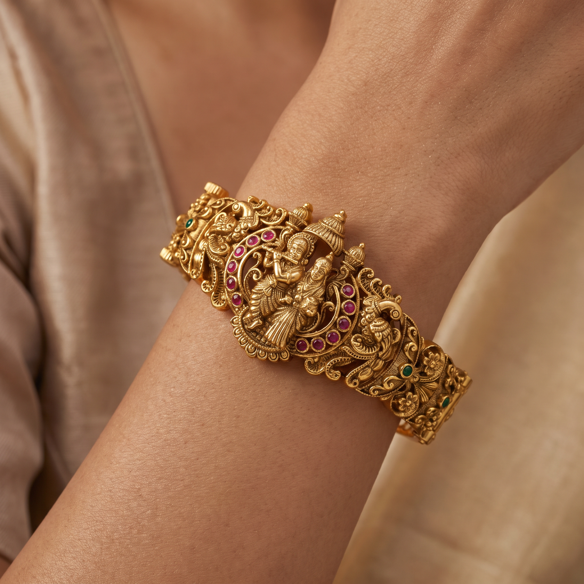 Festive Kada with a sculpted Radhe Krishna centre and detailed temple-style borders