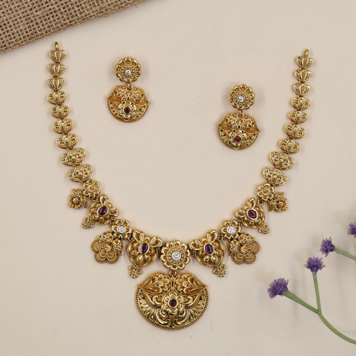 Statement Antique Necklace with sculpted floral panels and an ornate pendant drop