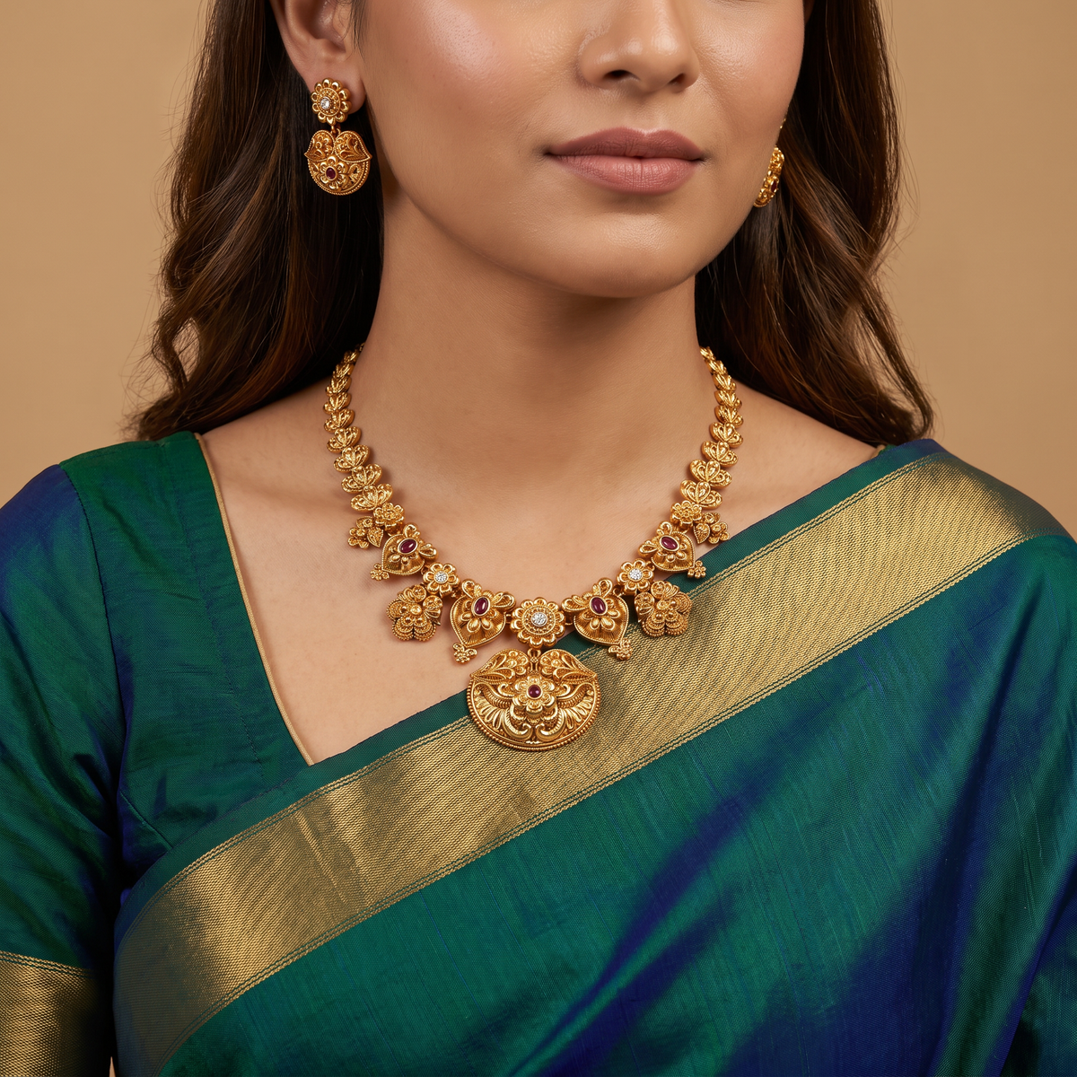 Statement Antique Necklace with sculpted floral panels and an ornate pendant drop