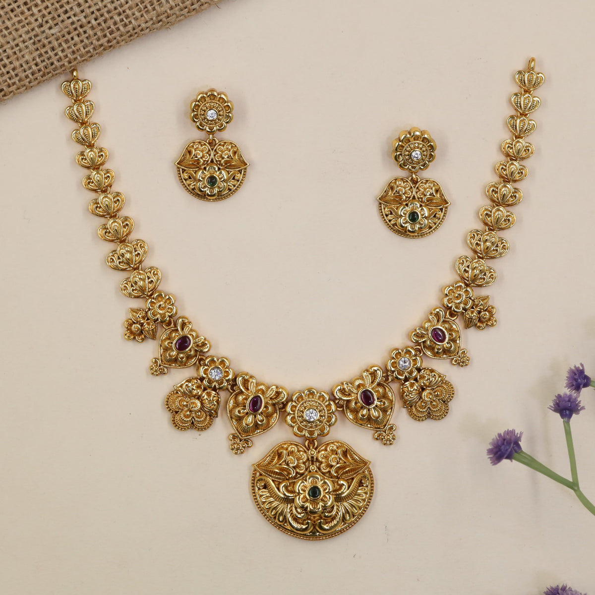 Statement Antique Necklace with sculpted floral panels and an ornate pendant drop