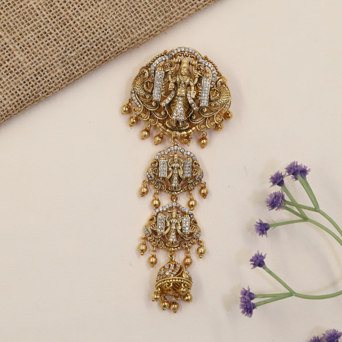 Venkateshwara Jade Bille featuring sculpted deity panels and graceful hanging drops