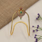 Signature Vanki featuring a floral crest, intricate scrollwork and refined traditional artistry