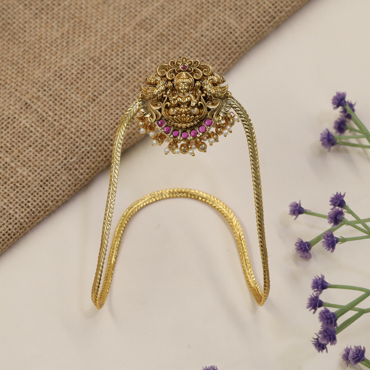 Traditional Vanki with a detailed Lakshmi panel, ornate scrollwork and graceful drops
