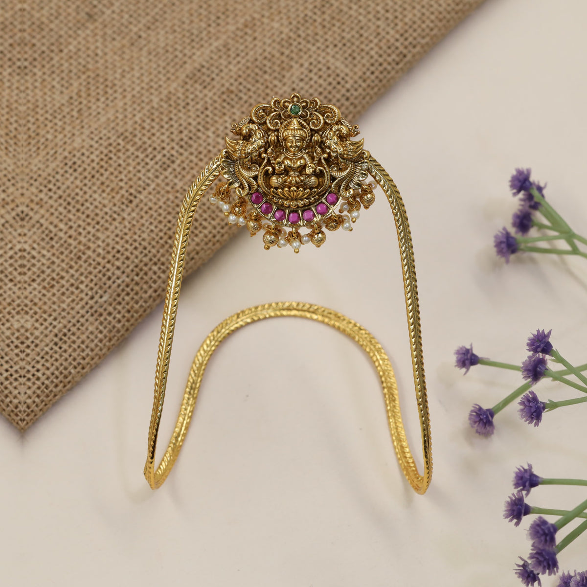 Traditional Vanki with a detailed Lakshmi panel, ornate scrollwork and graceful drops