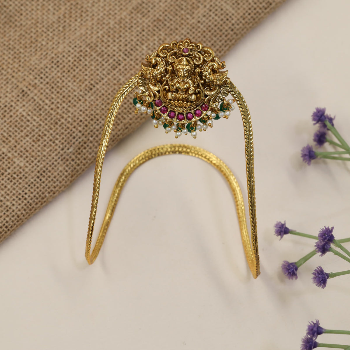 Traditional Vanki with a detailed Lakshmi panel, ornate scrollwork and graceful drops
