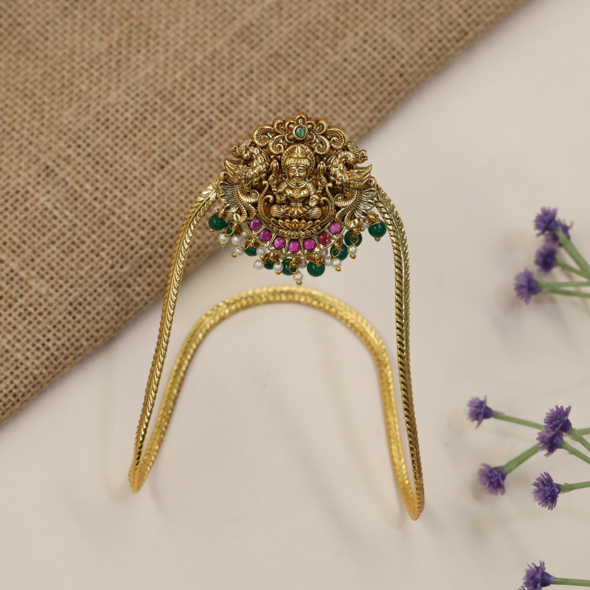 Traditional Vanki with a detailed Lakshmi panel, ornate scrollwork and graceful drops