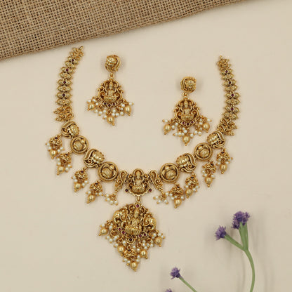 Antique Necklace with Lakshmi pendant and ornate floral craftsmanship