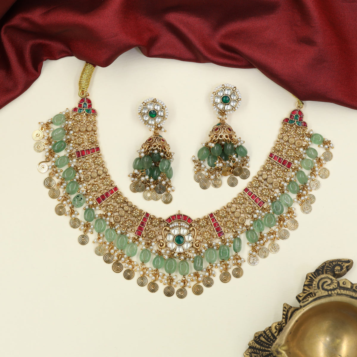 Grand Jadau Necklace featuring botanical detailing and a flowing fringe