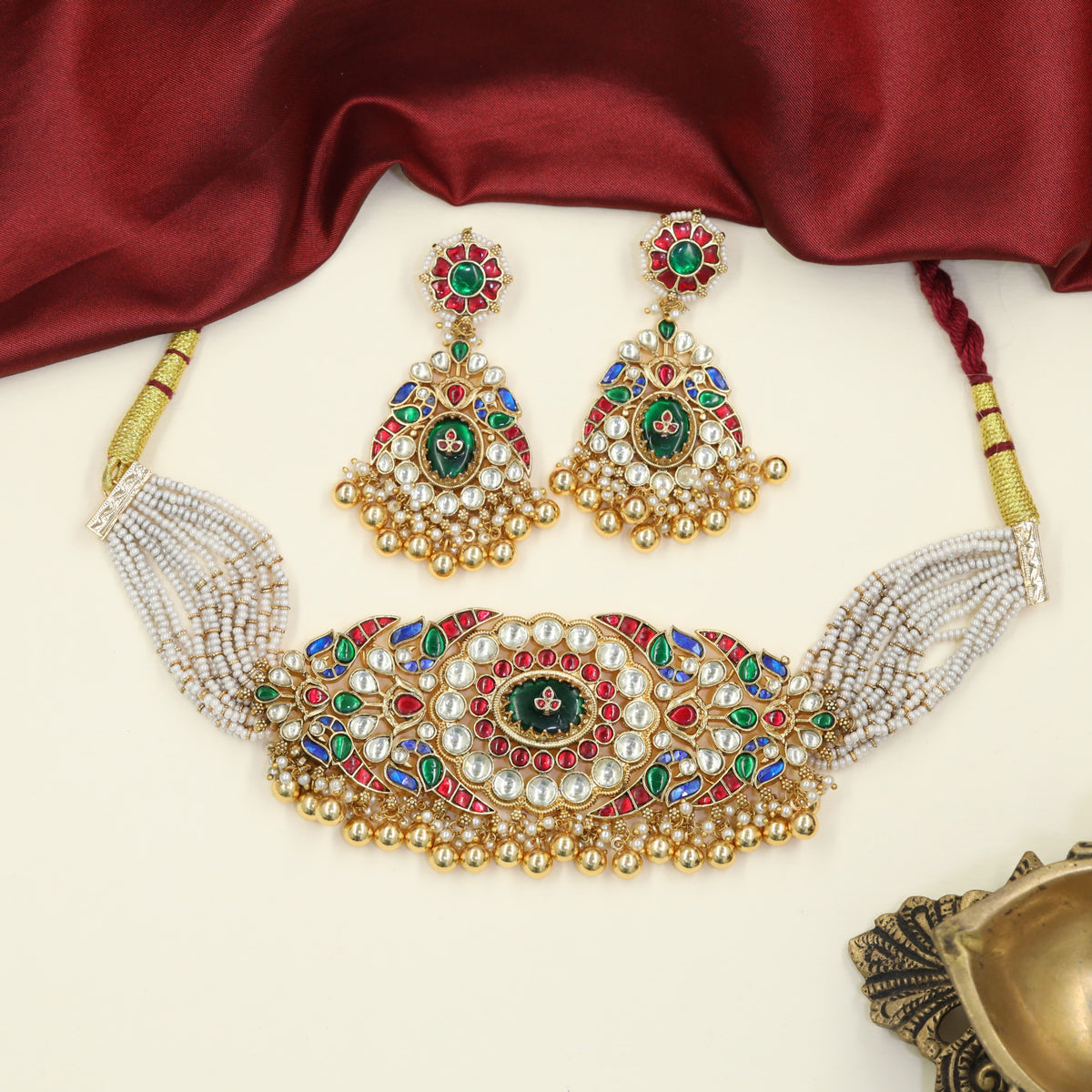 Jadau Choker with graceful peacock forms and floral centre detailing