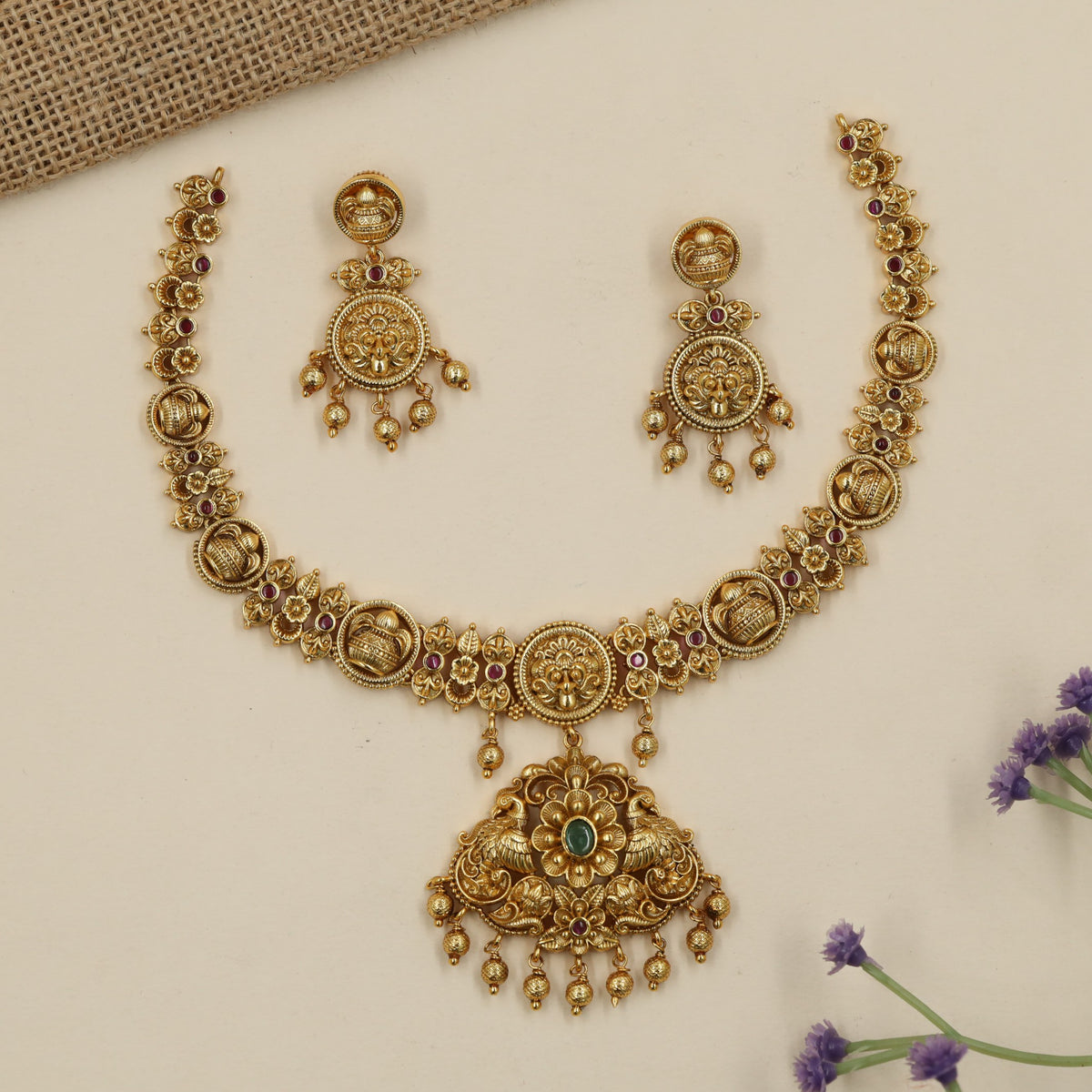 Royal Antique Necklace with a richly sculpted centre and graceful peacock forms