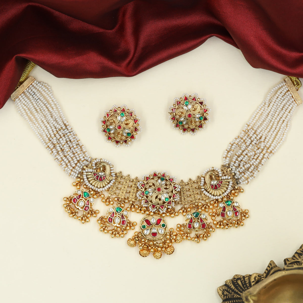 Grand occasion Jadau Choker carrying intricate floral artistry across its central panel