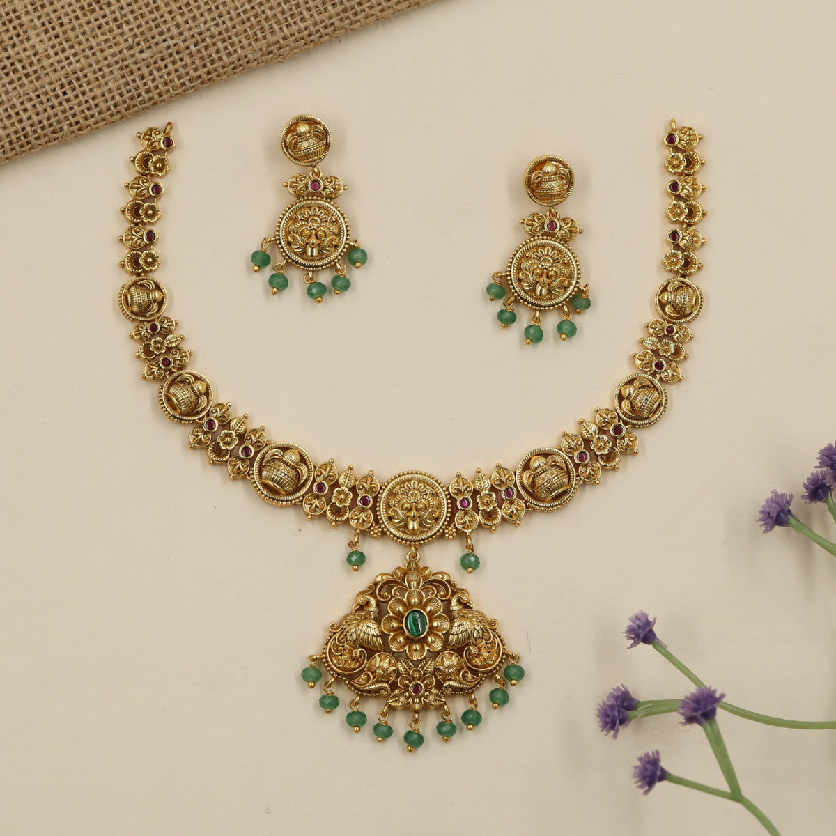 Royal Antique Necklace with a richly sculpted centre and graceful peacock forms