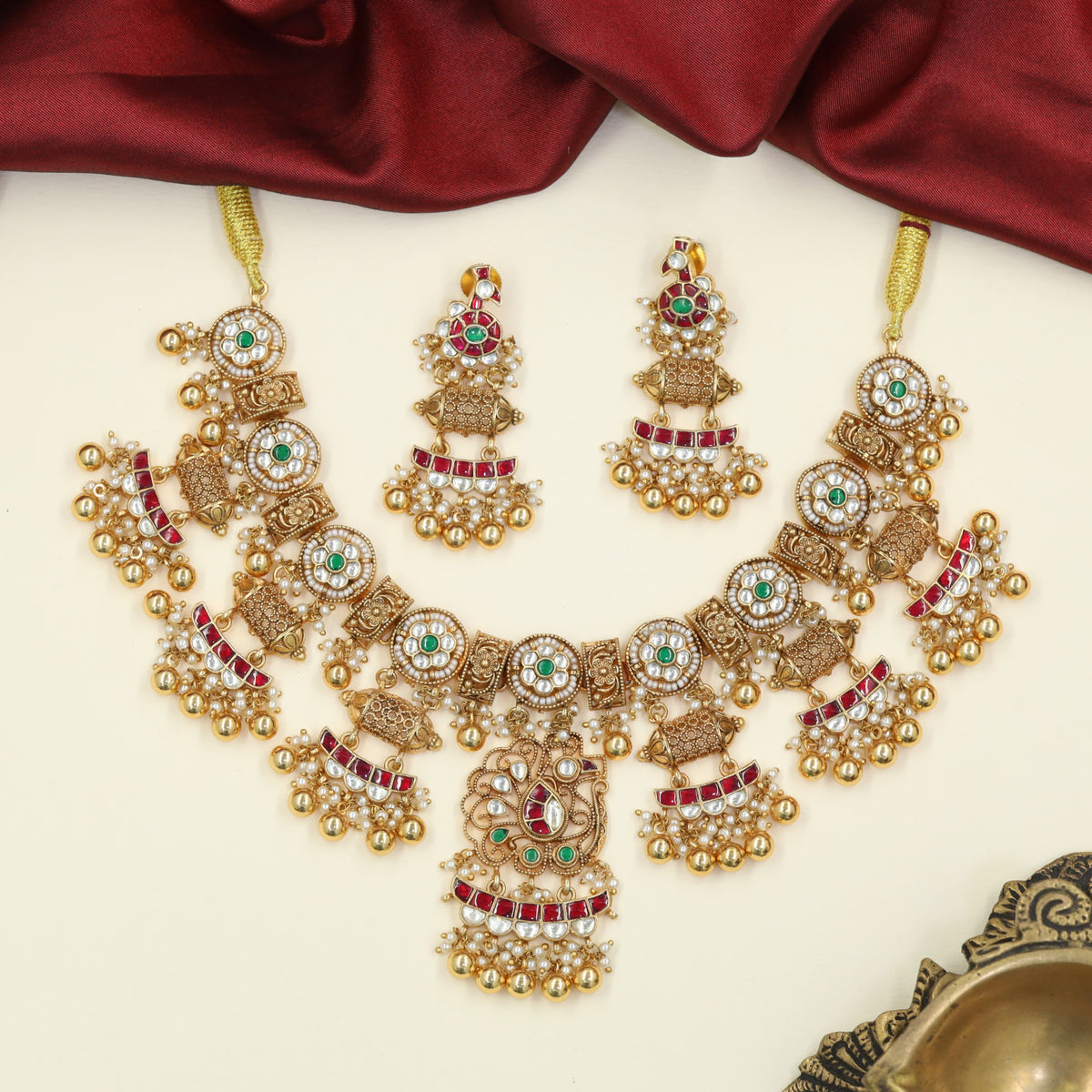 Vintage-inspired Jadau Necklace with traditional filigree craftsmanship and hanging bell details