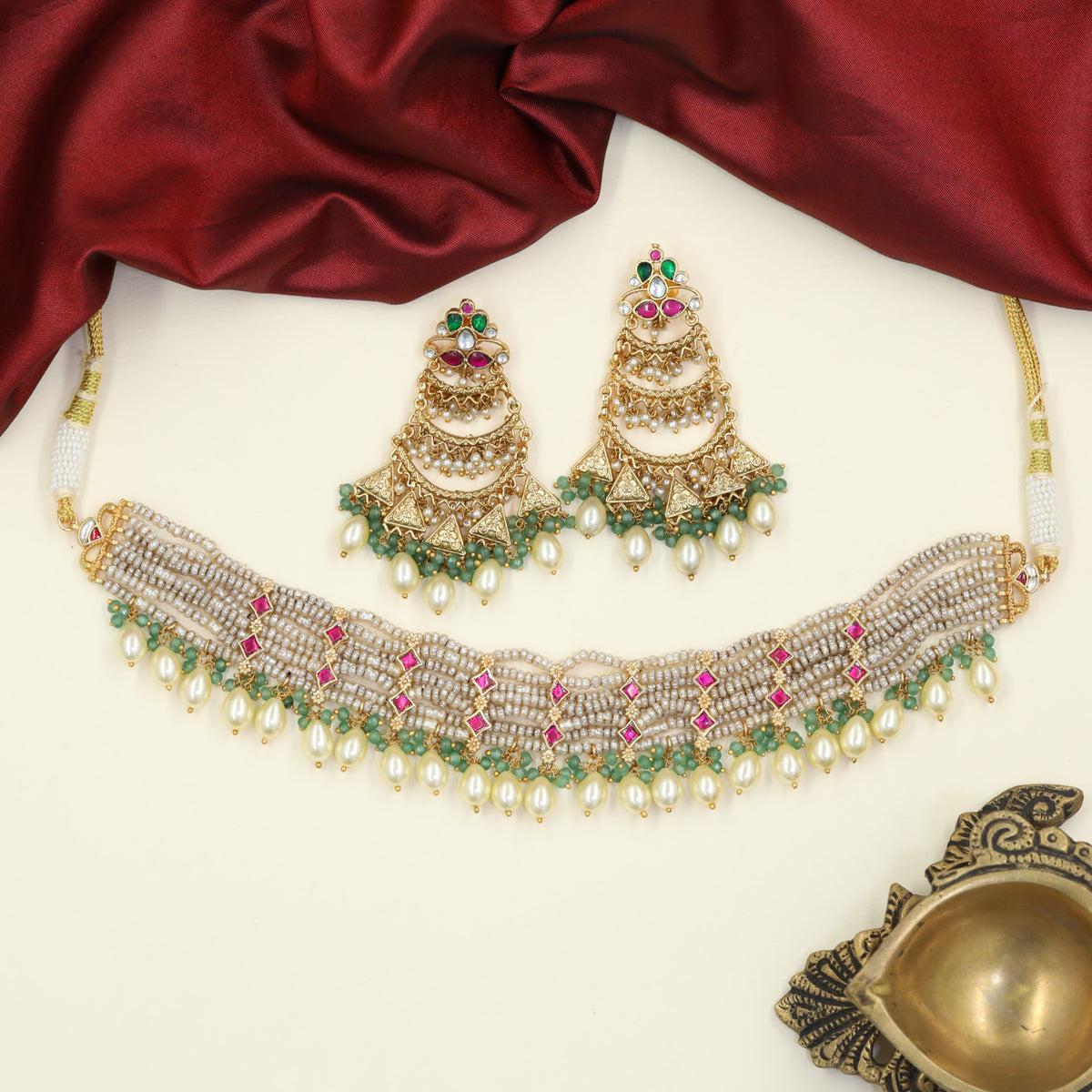 Jadau Beads Choker with cascading pearl fringe and sculpted floral accents