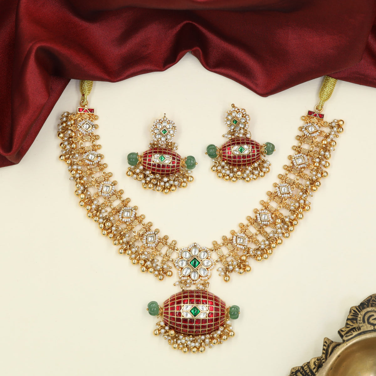 A heritage Jadau Necklace with oval lattice drops and delicate bead fringe