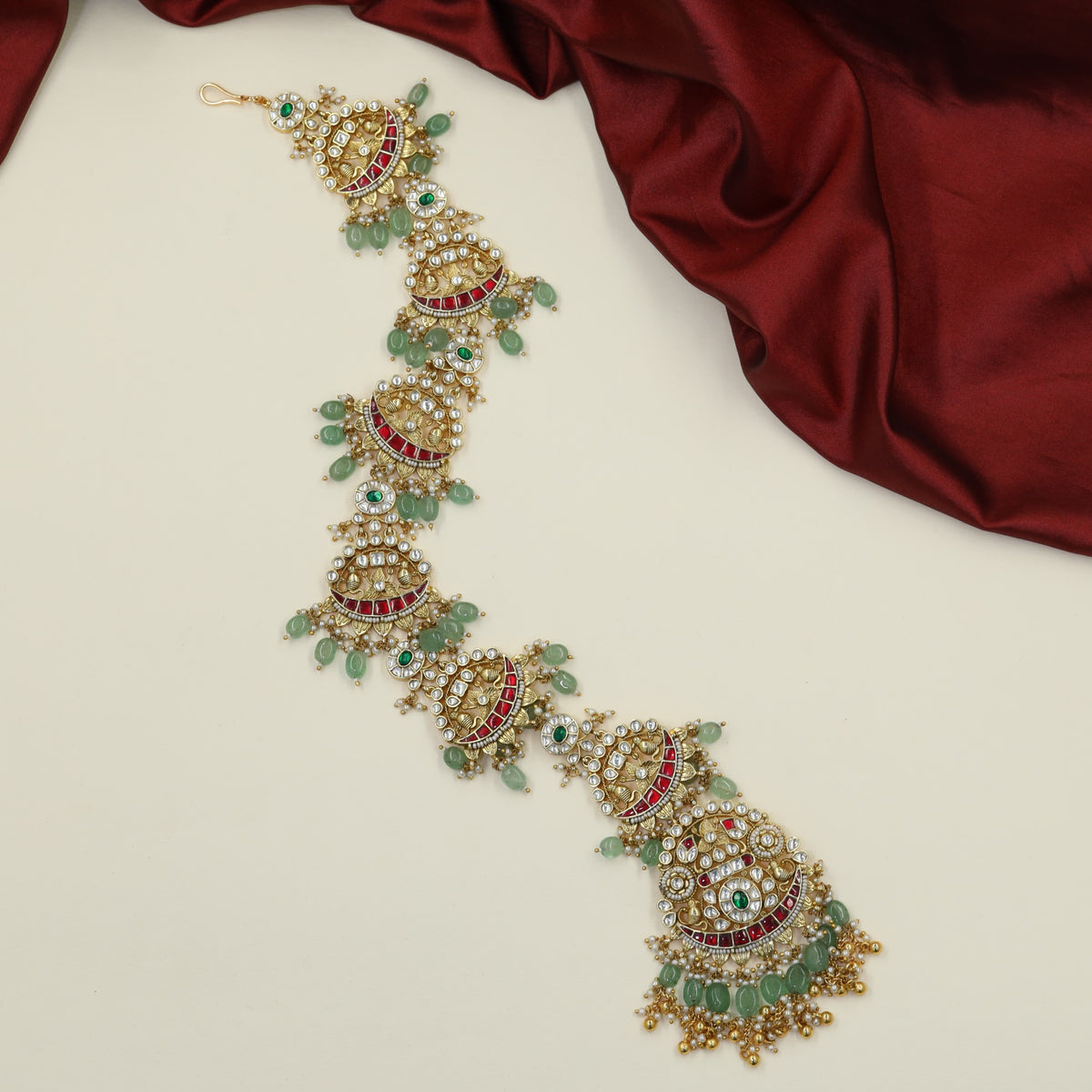 Signature Jadau Long Jade showcasing intricate openwork and ornamental fringe
