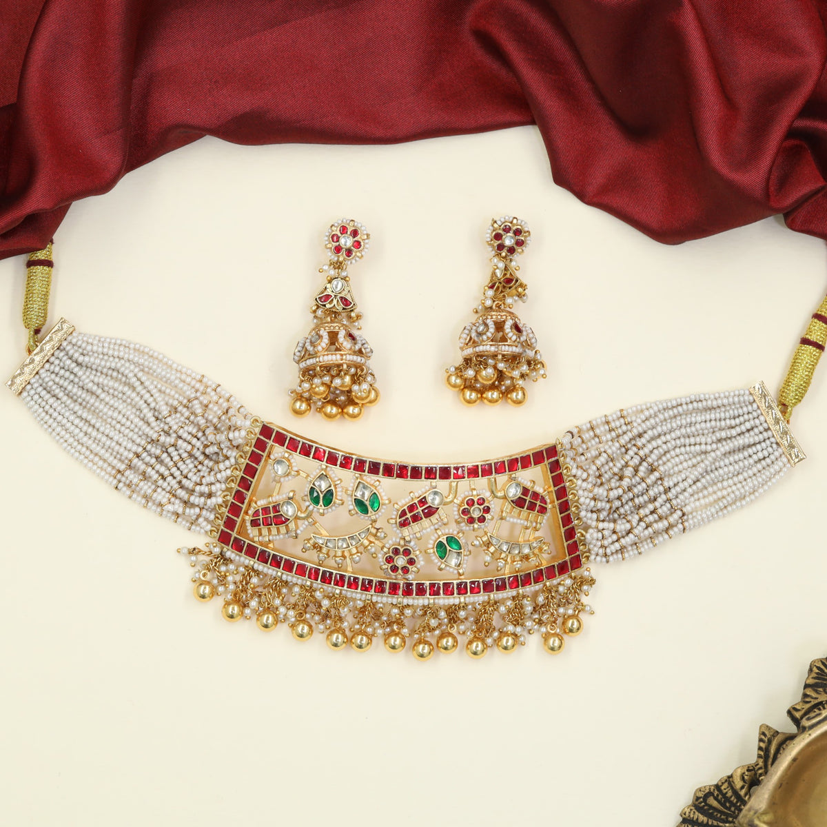 Jadau Beads Choker enhanced by multiple bead strands, botanical forms and decorative fringe